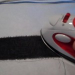 Iron the strip flat