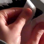 Tear of the paper from the back