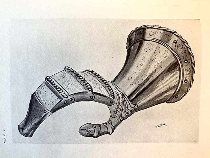book plate showing a watercolor painting of a steel gauntlet