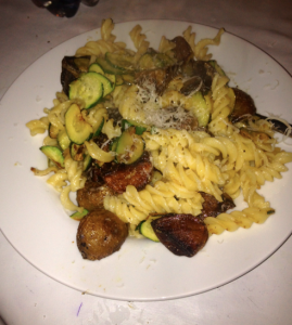 Roasted potatoes, zucchini and pasta with shaved provolone