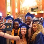 five students taking a selfie