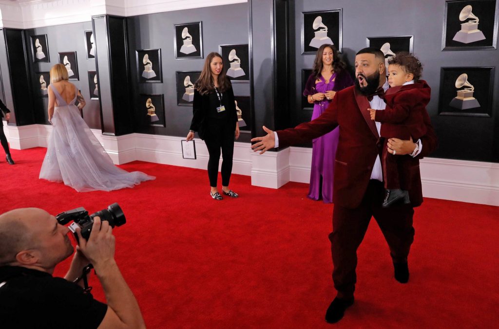 DJ Khaled, son Jared and back of Julia Michaels on the Grammys red carpet