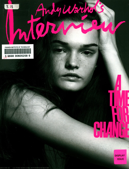 Cover of Andy Warhol's Interview magazine showing black and white photo of young woman