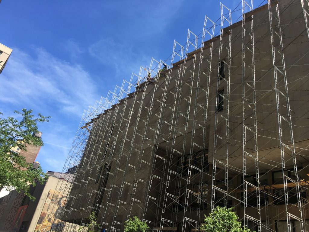 Scaffolding on the facade of the Goodman Resource Center, May 2018.