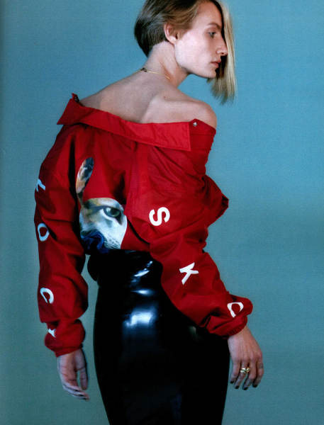 Fashion photo from Interview magazine showing blond woman in red shirt