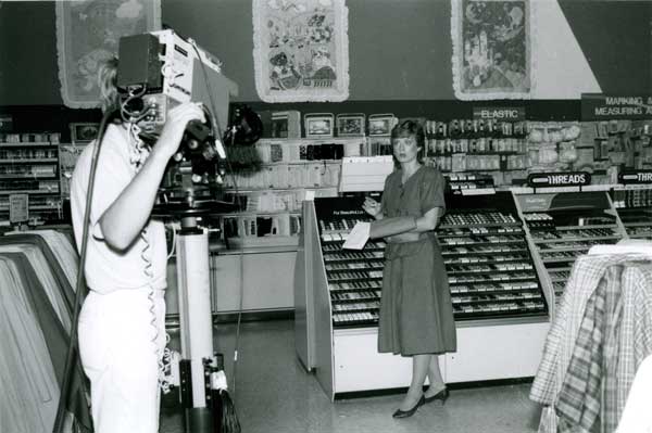 Nancy Zieman being filmed at a fabric store in the 1980s