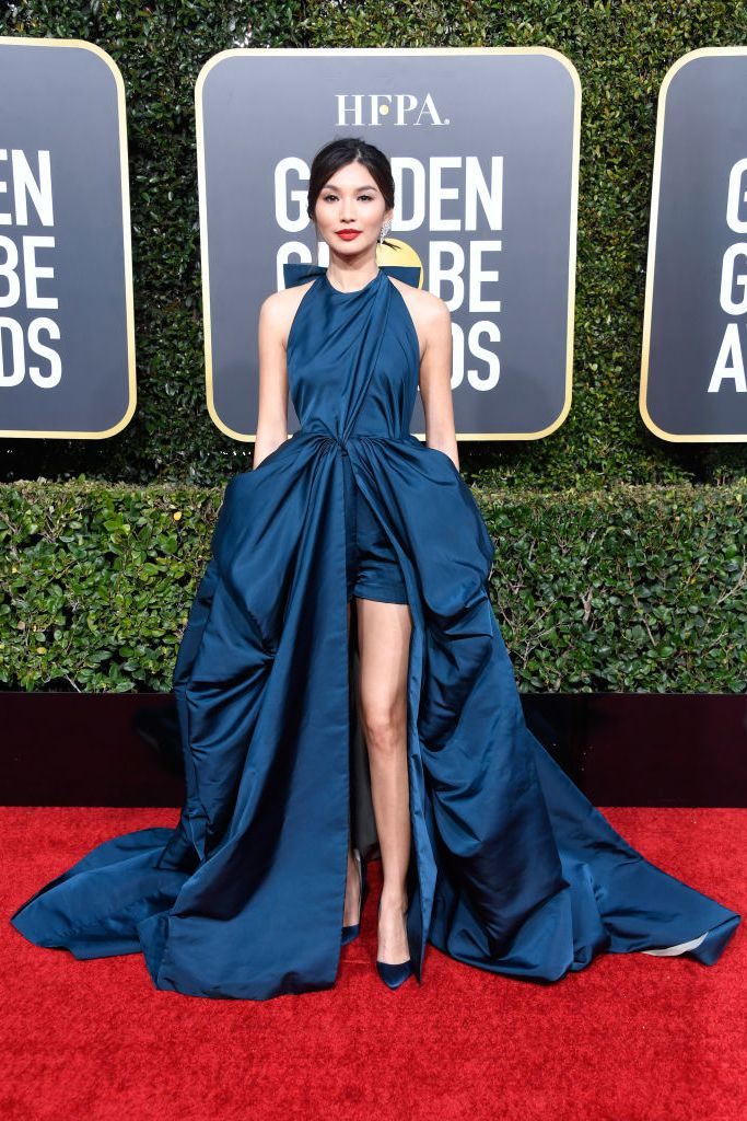 Gemma Chan in blue gown on Golden Globes red carpet
