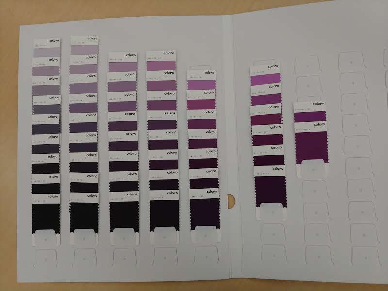 Coloro book of purples arranged by hue, tint, and shade.