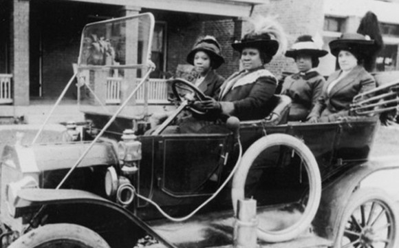 Entrepreneur Madame C J Walker in a car with friends c. 1914